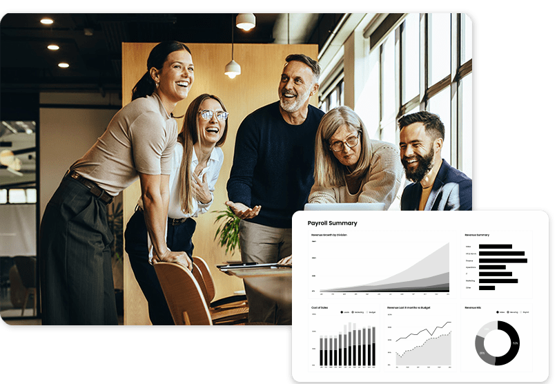 Five people smiling around a table in an office, with a graph and charts displayed on a screen in the foreground.